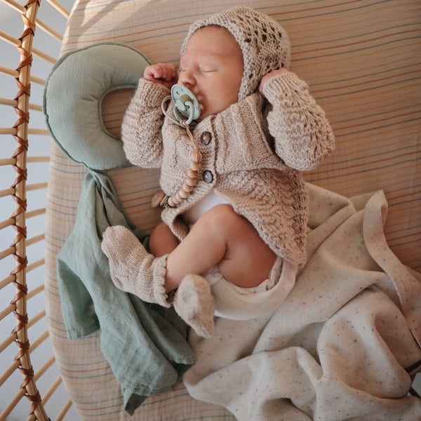 Soft Moon Lovey Blanket for babies, perfect for cuddling and comfort, shown at an angle for detail.