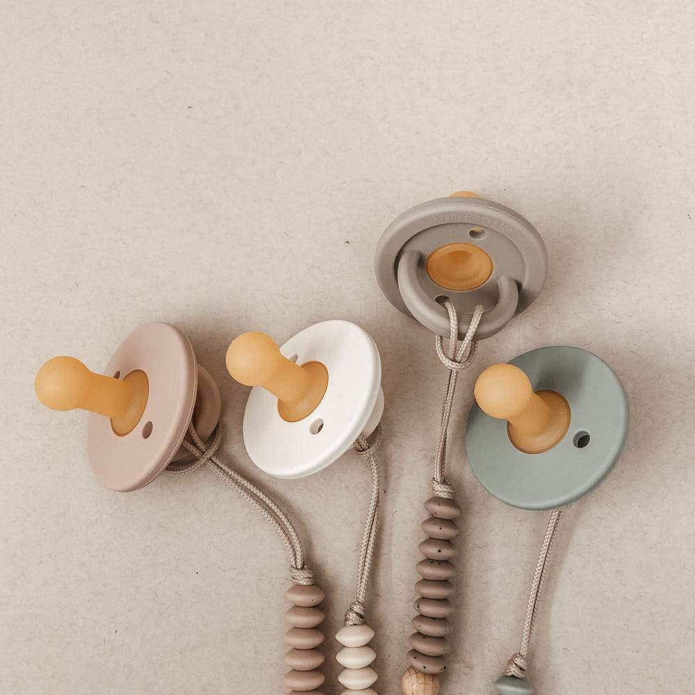 Modern Mahogany Rose pacifier for babies, stylish and soothing for little ones.