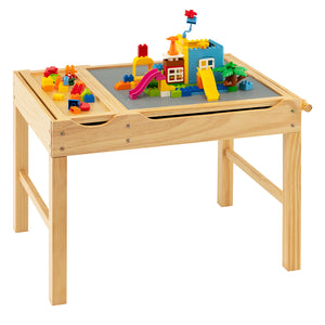Kids multi-activity wooden play table with building blocks, storage, and paper roll, angled view.
