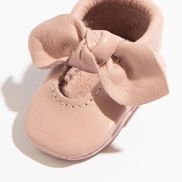 Newborn blush knotted bow baby shoe, angle 2, perfect for stylish little feet.