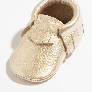 Newborn Platinum Moccasin Baby Shoe - Stylish and soft footwear for infants, shown from angle 2.