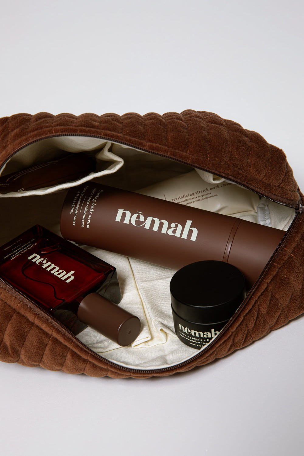 "Firming Serum Travel Set for moms, perfect for on-the-go skincare."