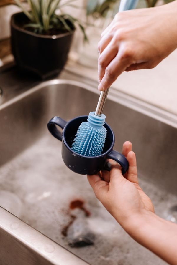 Haakaa Silicone Cleaning Brush Kit for safe and effective bottle cleaning, shown from angle 13.