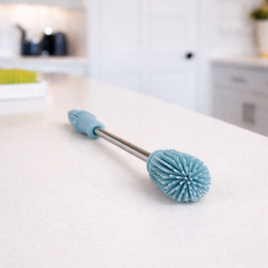 Haakaa Double-Ended Silicone Brush for easy bottle cleaning, shown at angle 7. Perfect for baby care essentials.