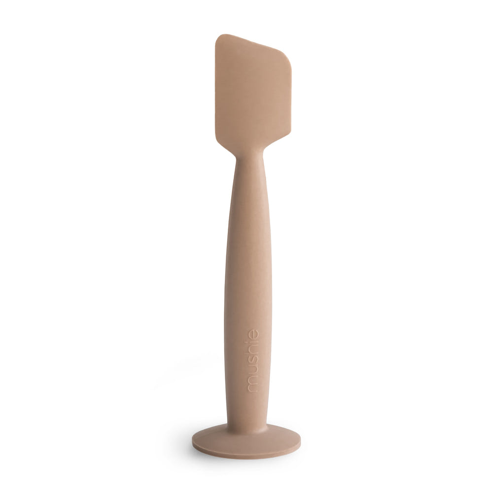 Diaper cream applicator for easy, mess-free application on baby's skin.