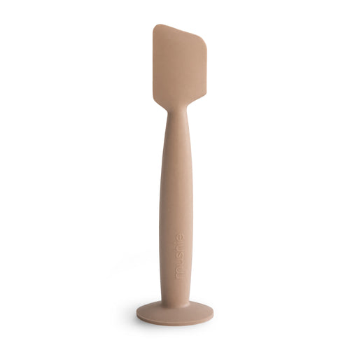 Diaper cream applicator for easy, mess-free application at angle 2, perfect for parents and caregivers.