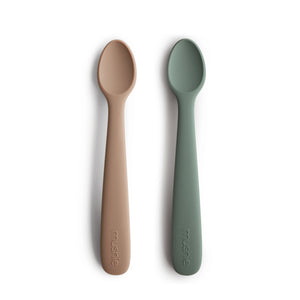 Silicone feeding spoons for babies, angled view showcasing soft, safe design for easy feeding.