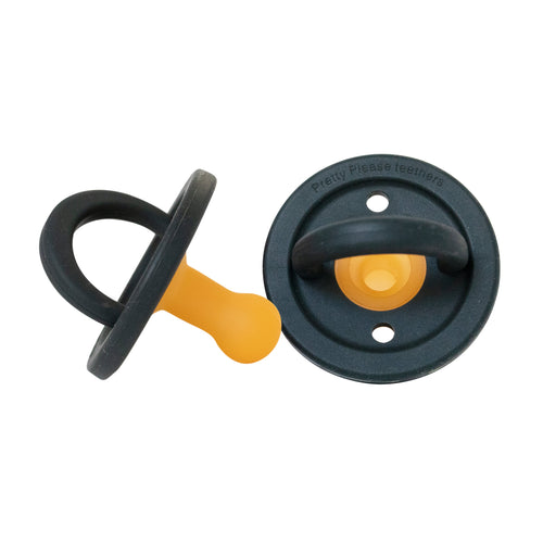Modern navy pacifier for babies, designed for comfort and style. Perfect for soothing infants.