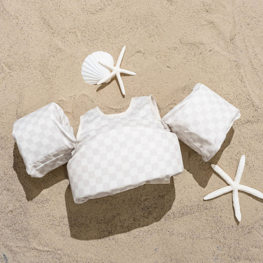 Neutral checkered kids float for safe and fun water play, perfect for summer adventures.