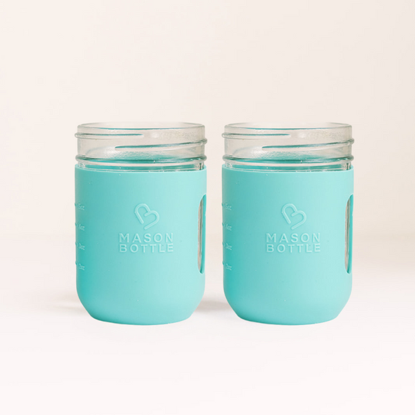 Silicone sleeve for cups, 2 pack, designed for baby safety and grip, shown from angle 4.