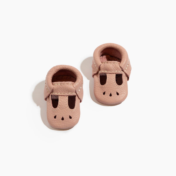 Newborn blush Mary Jane baby shoe, perfect for stylish infant footwear.