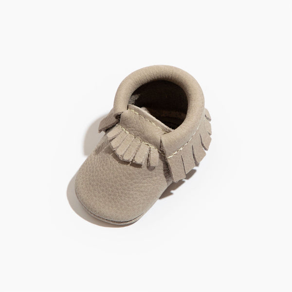 Newborn Salt Flats Moccasin Baby Shoe in angle view, soft and stylish footwear for infants.