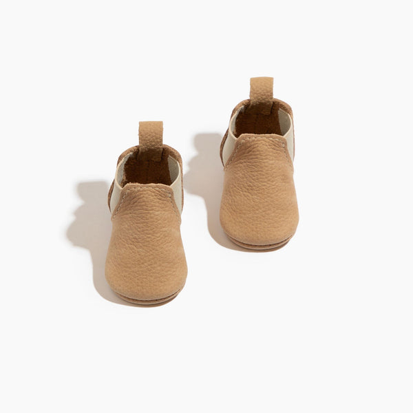 Newborn weathered brown Chelsea boot baby shoe, stylish and comfortable for little feet.