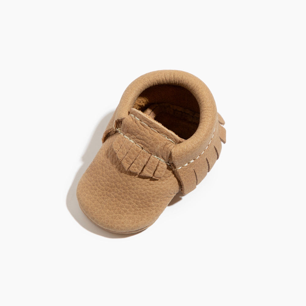 Newborn weathered brown moccasin baby shoe for stylish and comfortable infant footwear.