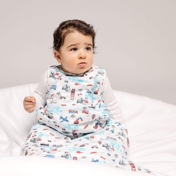 One & Done Sleep Sack in Transportation design, cozy and safe for babies, shown from angle 6.