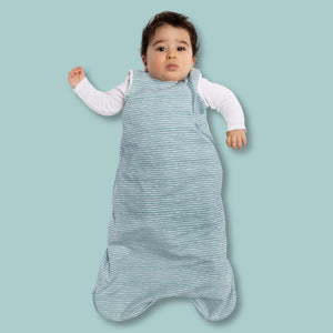 One & Done Sleep Sack in green stripes, perfect for keeping your baby cozy and safe during sleep.