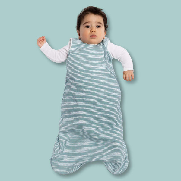 One & Done Sleep Sack in green stripes, perfect for keeping your baby cozy and safe during sleep.