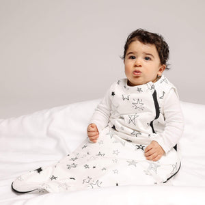 One & Done Sleep Sack in star pattern, angle view, perfect for keeping babies cozy and safe during sleep.