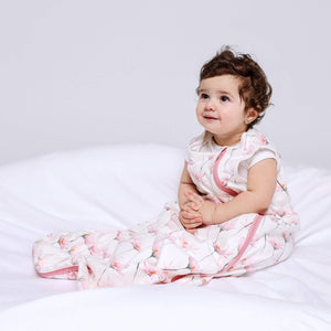 One & Done Sleep Sack in Pink Petals design, angle view showcasing soft fabric and cozy fit for babies.