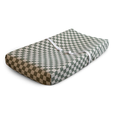 Extra soft muslin changing pad cover in a soothing color, perfect for baby's comfort and style during diaper changes.