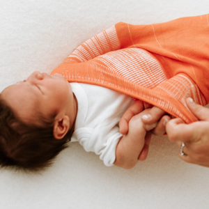Swaddelini Orange Swaddle Sleep Sack 3D Knit Seamless