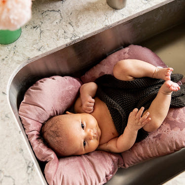 Infant Sink Bather in Orchid Haze, perfect for safe and comfortable baby bathing.