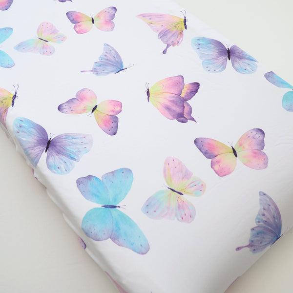 Butterfly changing pad cover in angle view, perfect for stylish and comfortable diaper changes.
