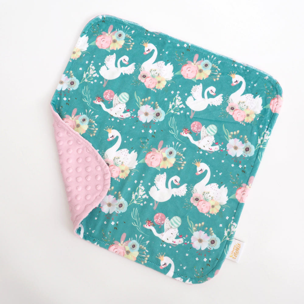 Soft Mini Minky Blanket featuring adorable swan design for babies, perfect for cuddling and comfort.
