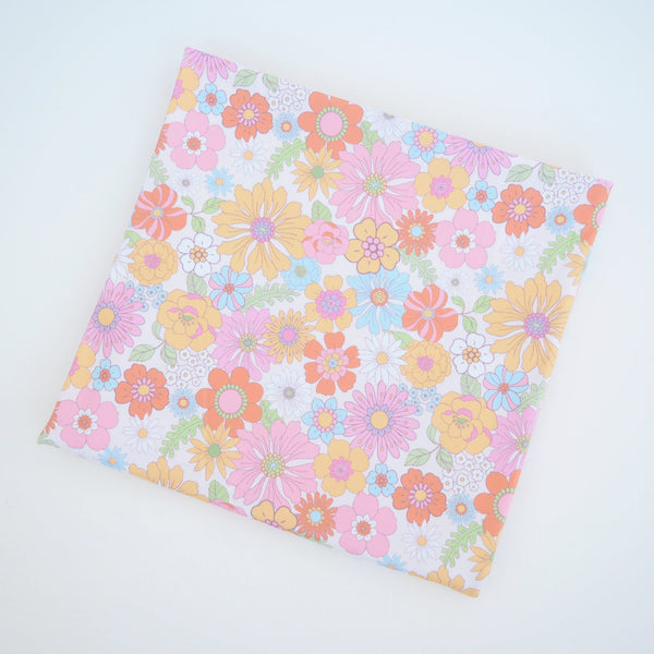 Retro floral baby swaddle blanket in angle 6, perfect for cozy and stylish infant wrapping.