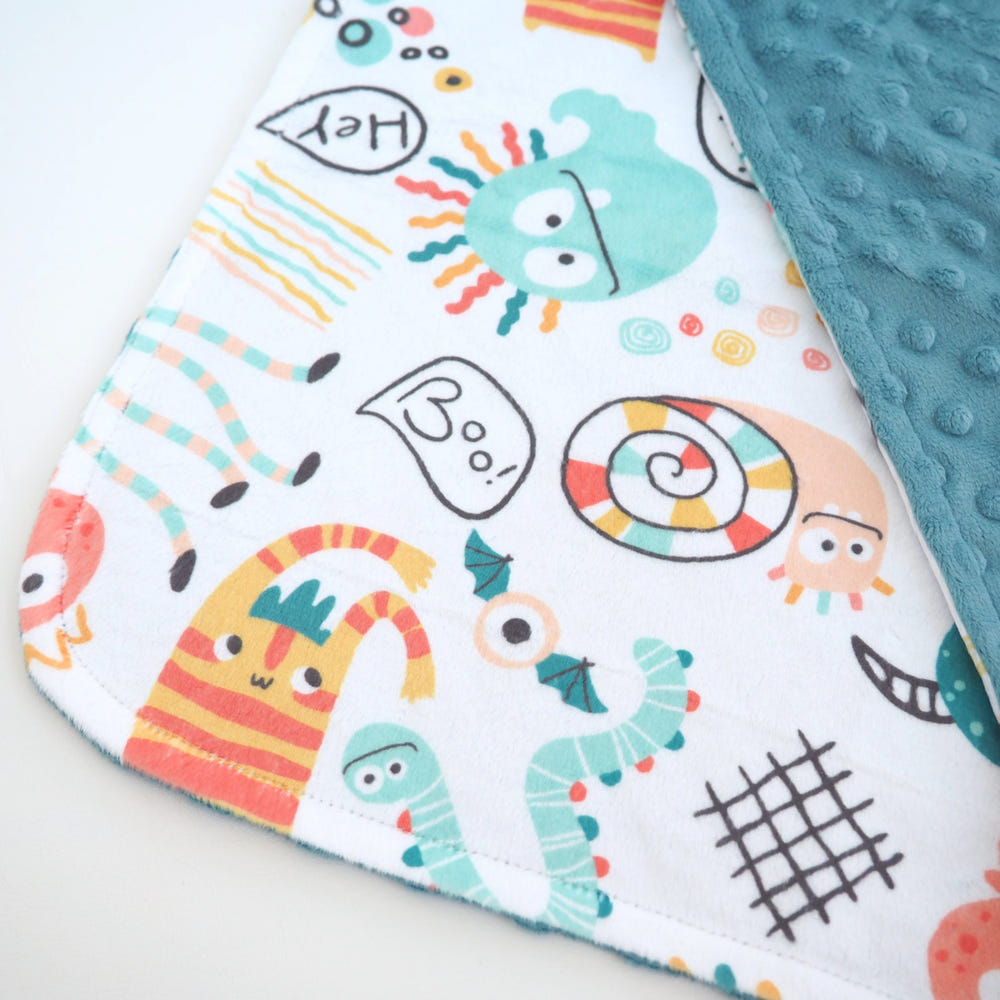 Mini Minky Blanket Monster Party for babies, soft bedding for cozy sleep and playful comfort.