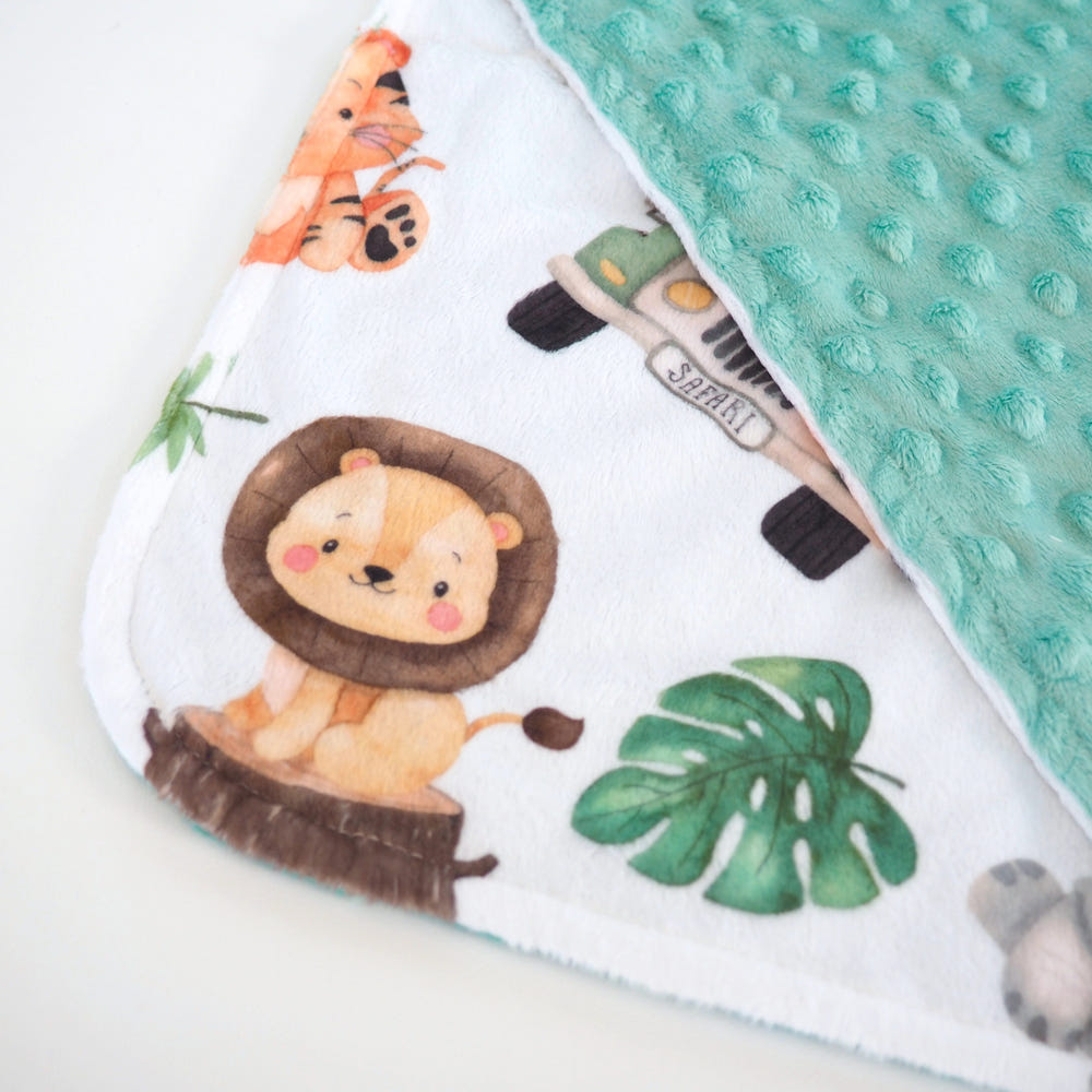 Mini Minky Blanket Safari - Soft, cozy baby blanket featuring a playful safari animal design. Perfect for cuddles!