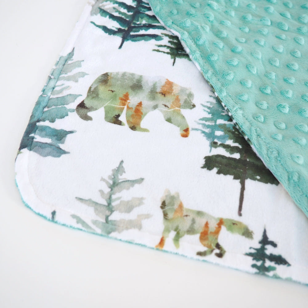 Mini Minky Blanket In The Woods - Soft, cozy baby blanket featuring a woodland design, perfect for infants.