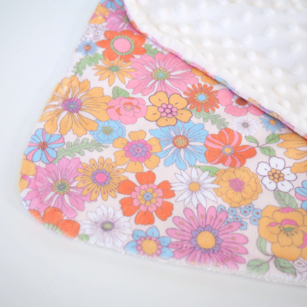 Mini Minky Blanket in Retro Floral design for cozy baby bedding and sleep.