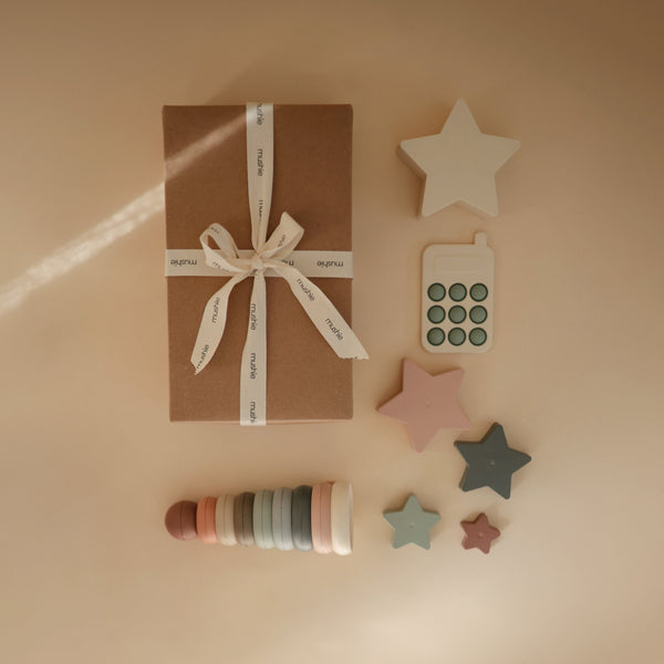 Everyday Play Gift Set for babies, showcasing toys and essentials at an angle, valued at $48.