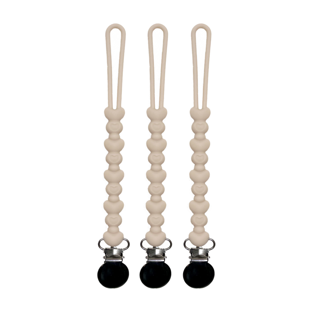 Love You More Pacifier & Teether Clip for babies, featuring a stylish design and secure attachment for comfort and convenience.