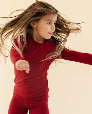 Ultimate Pajama Set in Crimson for babies, showcasing cozy design and soft fabric from angle 3.