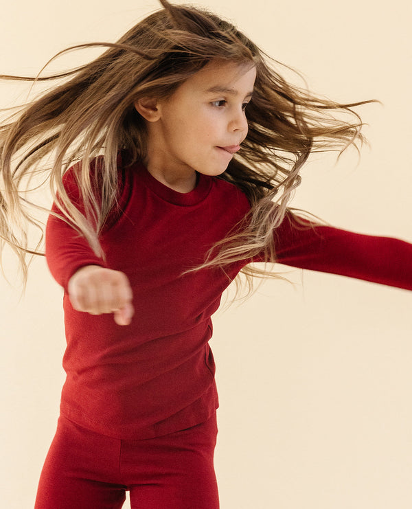 Ultimate Pajama Set in Crimson for babies, showcasing cozy design and soft fabric from angle 3.