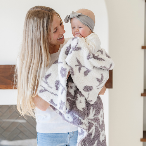 Double-layer Bamboni® receiving blankets for swaddling and comfort, perfect for newborns and infants.