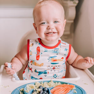 Retro Airplanes Bapron for babies, featuring a playful design, perfect for mealtime messes. Angle 7 view.