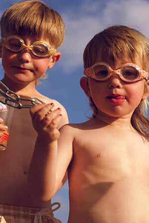 Anti UV fog swim goggles for babies, perfect for outdoor water play, shown at angle 10.