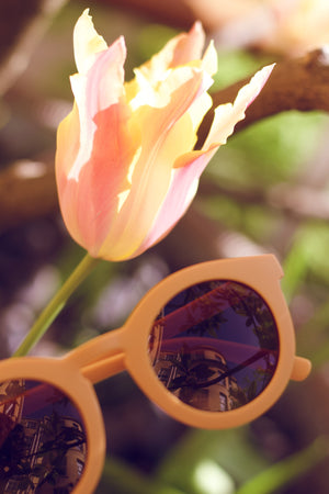 Classic plant-based polarized sunglasses for kids aged 3-8, bendable design, shown at angle 12. Sustainable style for little ones.