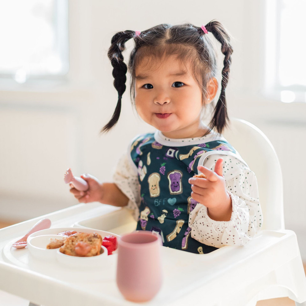 PBJ Pals Bapron for babies, featuring a colorful design and practical, mess-free coverage for mealtime.