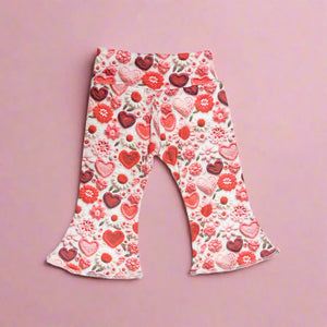 Sweet Hearts Club Valentine's Day heart bell bottom outfit for babies, featuring a cute two-piece set in vibrant colors.