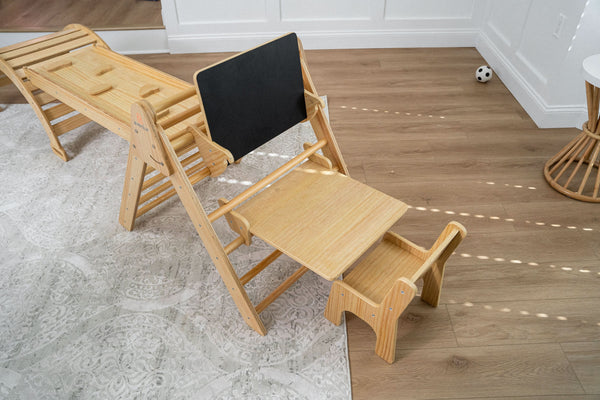 Angle 3 view of Hazel & Olive rocking chair with desk and chair attachment for babies.