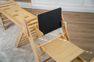 Desk and chair attachment for Hazel & Olive rocking chair, showcasing angle 7 design and functionality for baby comfort.