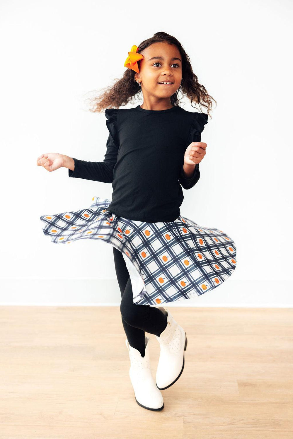 Plaid Pumpkins Twirl Skegging for babies, perfect for playful autumn outfits.