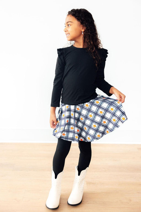 Plaid Pumpkins Twirl Skegging for babies, angle view showcasing playful design and comfortable fit.