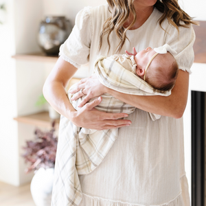 Minky stretch receiving blankets in soft pastel colors, perfect for swaddling and keeping your baby cozy.