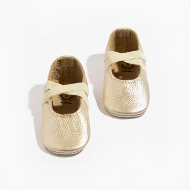 Platinum ballet slipper baby shoe, perfect for little dancers, featuring soft material and elegant design.