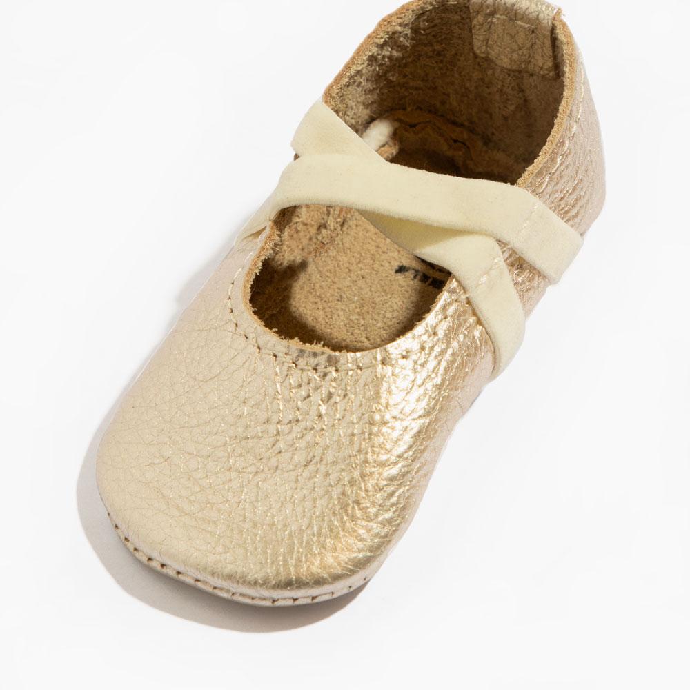 Platinum ballet slipper baby shoe, perfect for little dancers, featuring soft material and elegant design.